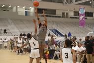 Long Island Lutheran SG Kiyan Anthony shoots over defender